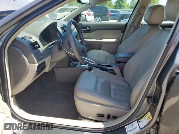2012 Ford Fusion Hybrid with VIN 3FADP0L3XCR315255, listed as a Copart auction lot 59548955 with 118,412 mi miles and Salvage title. Bid and sale history available at DreamBid. Image 7.