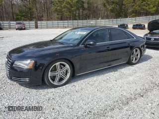 2013 Audi A8 3.0L with VIN WAUAGAFDXDN003929, listed as a Copart auction lot 44928465 with 186,921 mi miles and Salvage title. Bid and sale history available at DreamBid. Image 1.