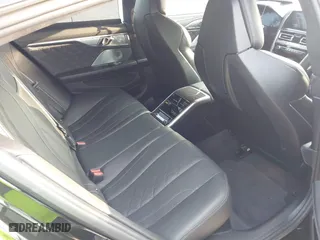 2020 BMW M8 with VIN WBSGV0C06LCD99264, listed as a IAAI auction lot 40276722 with 38,039 mi miles. Bid and sale history available at carsss.com. Image 8.