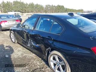 2015 BMW 3 Series 328i xDrive with VIN WBA3B3C57FF548161, listed as a IAAI auction lot 40383957 with 38,635 mi miles and . Bid and sale history available at DreamBid. Image 3.