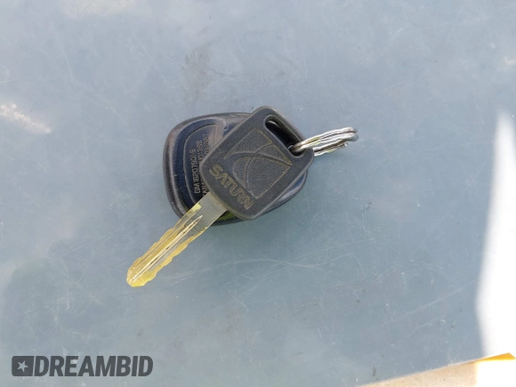 1997 Saturn SL z VIN 1G8ZH5285VZ117635, wystawiony jako IAAI lot #42153929 z przebiegiem 193 224 mil mil oraz . Historia ofert i sprzedaży dostępna na DreamBid. Obrazek 11.