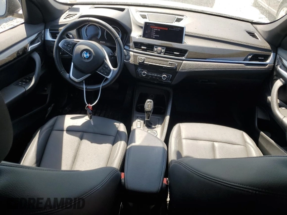 2021 BMW X1 xDrive28i with VIN WBXJG9C01M5T94314, listed as a Copart auction lot 60244134 with 43,933 mi miles and Salvage title. Bid and sale history available at DreamBid. Image 8.