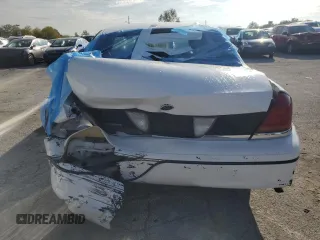 1999 Ford Crown Victoria Police with VIN 2FAFP71W7XX156457, listed as a Copart auction lot 71623954 with 123,313 mi miles and Salvage Title. Bid and sale history available at carsss.com. Image 6.
