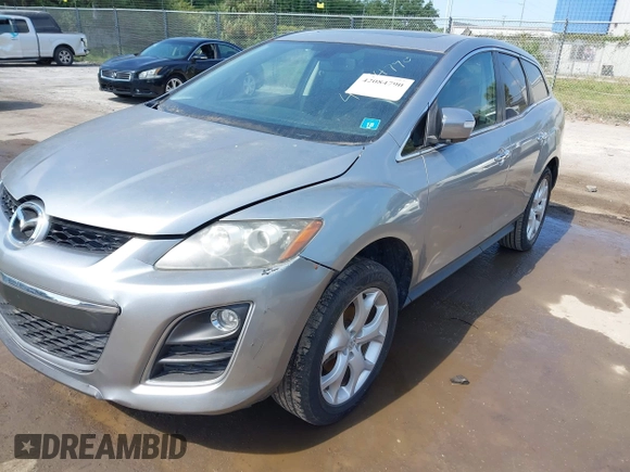 2010 Mazda CX-7 Touring with VIN JM3ER2W31A0348858, listed as a IAAI auction lot 42084790 with 136,261 mi miles. Bid and sale history available at carsss.com. Image 2.