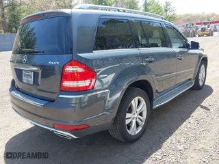 2011 Mercedes-Benz GL-Class GL 450 with VIN 4JGBF7BE9BA662497, listed as a IAAI auction lot 42102696 with 90,924 mi miles. Bid and sale history available at carsss.com. Image 4.
