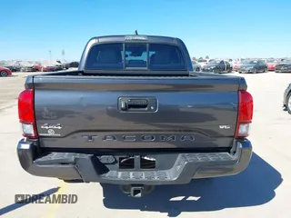 2023 Toyota Tacoma 4WD SR with VIN 3TYCZ5AN1PT146719, listed as a IAAI auction lot 41406963 with 19,735 mi miles. Bid and sale history available at carsss.com. Image 17.