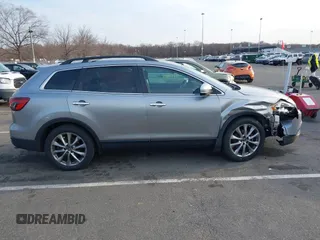 2015 Mazda CX-9 Grand Touring with VIN JM3TB3DA6F0447184, listed as a IAAI auction lot 41771865 with 137,814 mi miles. Bid and sale history available at carsss.com. Image 13.