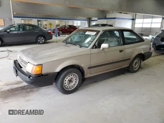 1990 Ford Escort z VIN 1FAPP9198LW113794, wystawiony jako Copart lot #48009265 z przebiegiem 67 809 mil mil oraz Czysty tytuł • Clean title. Historia ofert i sprzedaży dostępna na DreamBid. Obrazek 1.