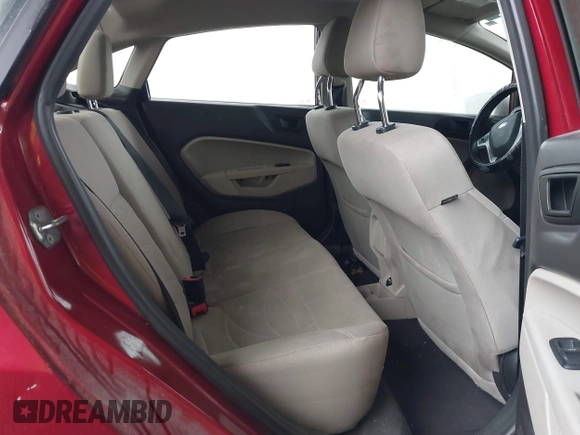 2017 Ford Fiesta SE z VIN 3FADP4BJ9HM159284, wystawiony jako IAAI lot #41291003 z przebiegiem 79 668 mil mil oraz . Historia ofert i sprzedaży dostępna na DreamBid. Obrazek 8.