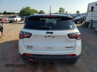 2021 Jeep Compass Trailhawk with VIN 3C4NJDDB2MT583833, listed as a Copart auction lot 58736675 with 67,090 mi miles and Salvage title. Bid and sale history available at DreamBid. Image 6.