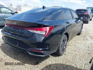 2022 Hyundai Elantra SEL with VIN KMHLM4AGXNU272717, listed as a IAAI auction lot 41879304 with 55,680 mi miles and . Bid and sale history available at DreamBid. Image 4.