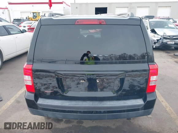 2013 Jeep Patriot Sport with VIN 1C4NJPBA3DD237887, listed as a IAAI auction lot 41599995 with 144,673 mi miles and . Bid and sale history available at DreamBid. Image 16.