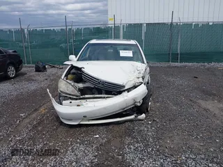 2005 Toyota Camry LE with VIN JTDBF30KX50165586, listed as a IAAI auction lot 41948322 with 84,326 mi miles and . Bid and sale history available at DreamBid. Image 12.