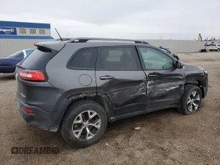 2015 Jeep Cherokee Trailhawk with VIN 1C4PJMBB6FW574108, listed as a Copart auction lot 57798475 with 105,022 mi miles and Salvage title. Bid and sale history available at DreamBid. Image 3.