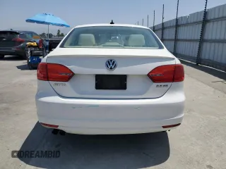 2013 Volkswagen Jetta SE with VIN 3VWDP7AJ5DM433357, listed as a Copart auction lot 61977205 with 64,384 mi miles and Salvage title. Bid and sale history available at DreamBid. Image 6.
