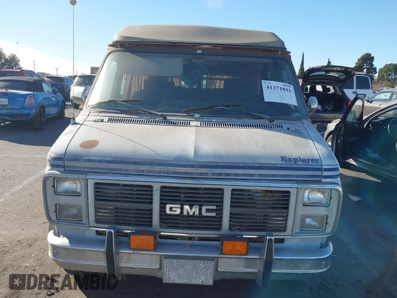 1989 GMC Vandura z VIN 1GDEG25K1K7521984, wystawiony jako IAAI lot #41371811 z przebiegiem 43 502 mil mil oraz . Historia ofert i sprzedaży dostępna na DreamBid. Obrazek 11.