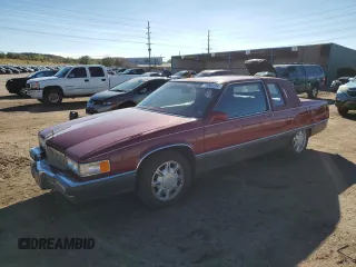 1989 Cadillac Fleetwood z VIN 1G6CB115XK4310775, wystawiony jako Copart lot #77044124 z przebiegiem 123 176 mil mil oraz Tytuł czysty. Historia ofert i sprzedaży dostępna na DreamBid. Obrazek 1.