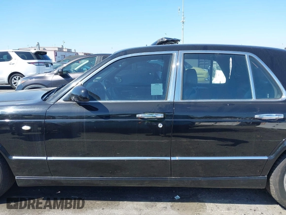 2001 Bentley Arnage with VIN SCBLC31E11CX06297, listed as a IAAI auction lot 41980275 with 63,510 mi miles and . Bid and sale history available at DreamBid. Image 14.