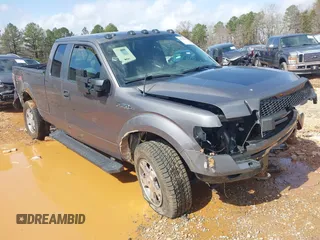 2009 Ford F-150 STX with VIN 1FTRX14809KC94736, listed as a IAAI auction lot 41721775 with 141,875 mi miles. Bid and sale history available at carsss.com. Image 1.