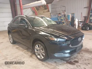 2023 Mazda CX-30 S Carbon Edition z VIN 3MVDMBCM0PM570103, wystawiony jako IAAI lot #42179866 z przebiegiem Nie podano mil oraz . Historia ofert i sprzedaży dostępna na DreamBid. Obrazek 1.