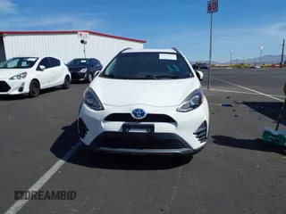 2018 Toyota Prius One with VIN JTDKDTB32J1599890, listed as a IAAI auction lot 42009820 with 57,959 mi miles and . Bid and sale history available at DreamBid. Image 12.