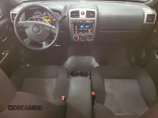 2010 GMC Canyon SLE1 with VIN 1GTJTCDE5A8148716, listed as a Copart auction lot 57559215 with 126,523 mi miles and Salvage title. Bid and sale history available at DreamBid. Image 8.