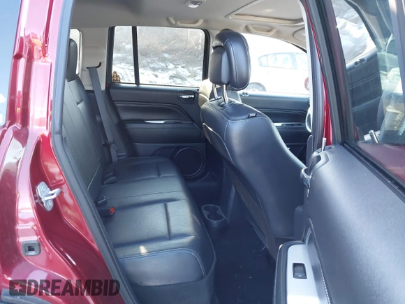 2016 Jeep Compass High Altitude Edition with VIN 1C4NJDEB7GD573341, listed as a IAAI auction lot 41269547 with 67,781 mi miles. Bid and sale history available at carsss.com. Image 8.