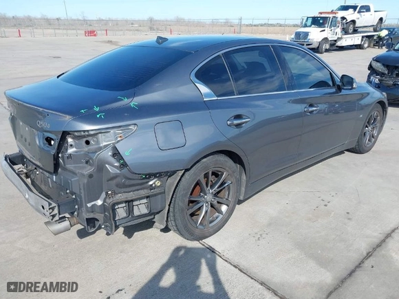 2015 Infiniti Q50 Premium with VIN JN1BV7AP0FM355933, listed as a IAAI auction lot 41684066 with 116,230 mi miles. Bid and sale history available at carsss.com. Image 4.