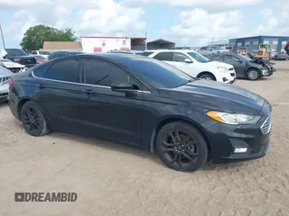 2020 Ford Fusion SE z VIN 3FA6P0HD4LR236433, wystawiony jako IAAI lot #42440932 z przebiegiem 94 975 mil mil oraz . Historia ofert i sprzedaży dostępna na DreamBid. Obrazek 1.