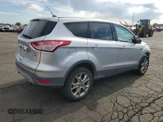 2013 Ford Escape SEL with VIN 1FMCU9HX6DUC11401, listed as a Copart auction lot 64862055 with 119,733 mi miles and Clean title. Bid and sale history available at DreamBid. Image 3.