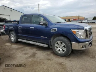 2017 Nissan Titan SV with VIN 1N6AA1EJXHN534790, listed as a Copart auction lot 52567735 with 184,884 mi miles and Salvage Title. Bid and sale history available at DreamBid. Image 4.