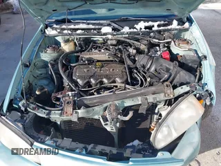 1998 Ford Escort SE with VIN 1FAFP13P8WW116840, listed as a IAAI auction lot 41329735 with 206,320 mi miles. Bid and sale history available at carsss.com. Image 10.