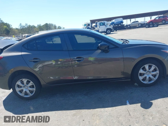2015 Mazda 3 i SV with VIN JM1BM1T72F1270488, listed as a IAAI auction lot 41827337 with 228,983 mi miles and . Bid and sale history available at DreamBid. Image 13.