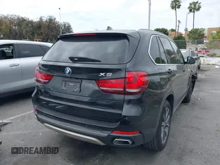2018 BMW X5 xDrive35i with VIN 5UXKR0C55JL073210, listed as a IAAI auction lot 42047558 with 37,497 mi miles. Bid and sale history available at carsss.com. Image 4.