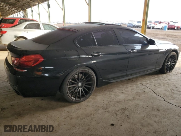 2014 BMW 6 Series 650i with VIN WBA6B2C52ED129040, listed as a Copart auction lot 83829924 with 116,674 mi miles and Salvage Title. Bid and sale history available at DreamBid. Image 3.