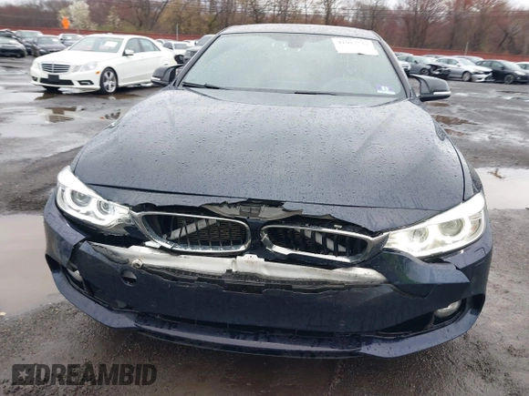 2016 BMW 4 Series 428i xDrive with VIN WBA4C9C59GG137067, listed as a IAAI auction lot 41913733 with 104,378 mi miles and . Bid and sale history available at carsss.com. Image 12.
