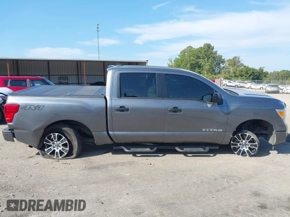 2023 Nissan Titan SV with VIN 1N6AA1EC6PN101712, listed as a IAAI auction lot 40206621 with 50,210 mi miles and . Bid and sale history available at DreamBid. Image 13.