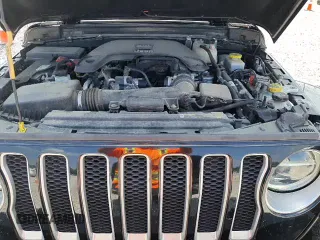 2021 Jeep Wrangler Unlimited Sahara Altitude with VIN 1C4HJXEG1MW605811, listed as a Copart auction lot 63214275 with 81,473 mi miles and Salvage title. Bid and sale history available at DreamBid. Image 14.