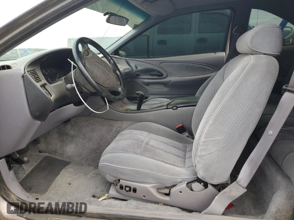 1994 Ford Thunderbird LX with VIN 1FALP6241RH110457, listed as a Copart auction lot 76384254 with 54,653 mi miles and Salvage Title. Bid and sale history available at DreamBid. Image 7.