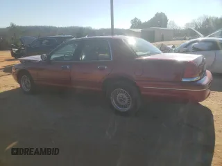 1998 Ford Crown Victoria LX с VIN 2FAFP74W3WX138757, выставлен на аукционе Copart как лот 87867945 с пробегом 148 827 миль миль и Списание • Salvage title. История ставок и продаж доступна на DreamBid. Изображение 2.