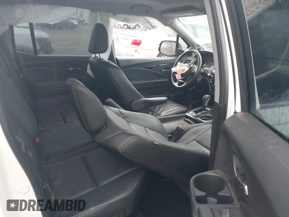 2018 Honda Ridgeline RTL-E with VIN 5FPYK3F77JB017293, listed as a IAAI auction lot 42422614 with 87,700 mi miles and . Bid and sale history available at DreamBid. Image 8.