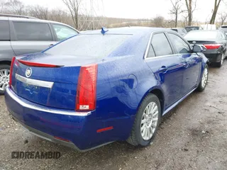 2012 Cadillac CTS with VIN 1G6DC5E59C0121787, listed as a IAAI auction lot 41718450 with 131,568 mi miles and . Bid and sale history available at DreamBid. Image 4.
