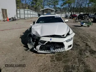 2016 Maserati Ghibli z VIN ZAM57XSAXG1167773, wystawiony jako Copart lot #46607705 z przebiegiem 62 421 mil mil oraz Szkoda całkowita • Salvage title. Historia ofert i sprzedaży dostępna na DreamBid. Obrazek 13.