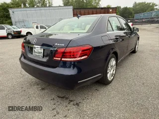 2014 Mercedes-Benz E 350 Luxury with VIN WDDHF8JB3EA885821, listed as a Copart auction lot 60853215 with 163,195 mi miles and Clean title. Bid and sale history available at DreamBid. Image 4.