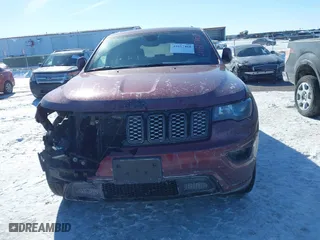 2019 Jeep Grand Cherokee Laredo E with VIN 1C4RJFAG1KC802450, listed as a IAAI auction lot 41617468 with 95,318 mi miles. Bid and sale history available at carsss.com. Image 12.