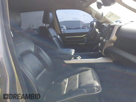 2019 Ram 1500 Laramie with VIN 1C6SRFJT8KN686506, listed as a IAAI auction lot 42499382 with 145,287 mi miles and . Bid and sale history available at DreamBid. Image 5.
