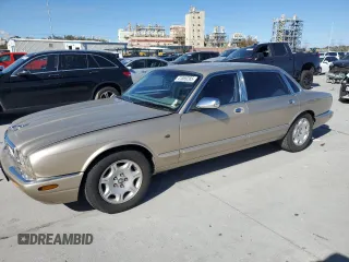 2000 Jaguar XJ Vanden Plas with VIN SAJDA24C7YLF07071, listed as a Copart auction lot 41869285 with 58,321 mi miles and Salvage title. Bid and sale history available at DreamBid. Image 1.