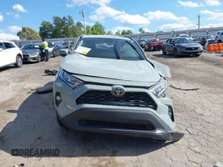 2020 Toyota RAV4 XLE with VIN 2T3W1RFV0LC081789, listed as a IAAI auction lot 42272557 with 91,399 mi miles and . Bid and sale history available at DreamBid. Image 6.