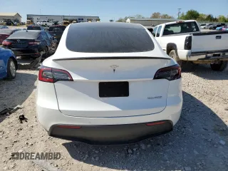 2021 Tesla Model Y Performance with VIN 5YJYGDEF7MF269221, listed as a Copart auction lot 52109785 with 61,619 mi miles and Salvage Title. Bid and sale history available at DreamBid. Image 6.