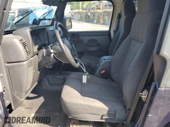 2003 Jeep Wrangler Sport z VIN 1J4FA49S13P347815, wystawiony jako Copart lot #59536685 z przebiegiem 74 298 mil mil oraz Szkoda całkowita • Salvage title. Historia ofert i sprzedaży dostępna na DreamBid. Obrazek 7.